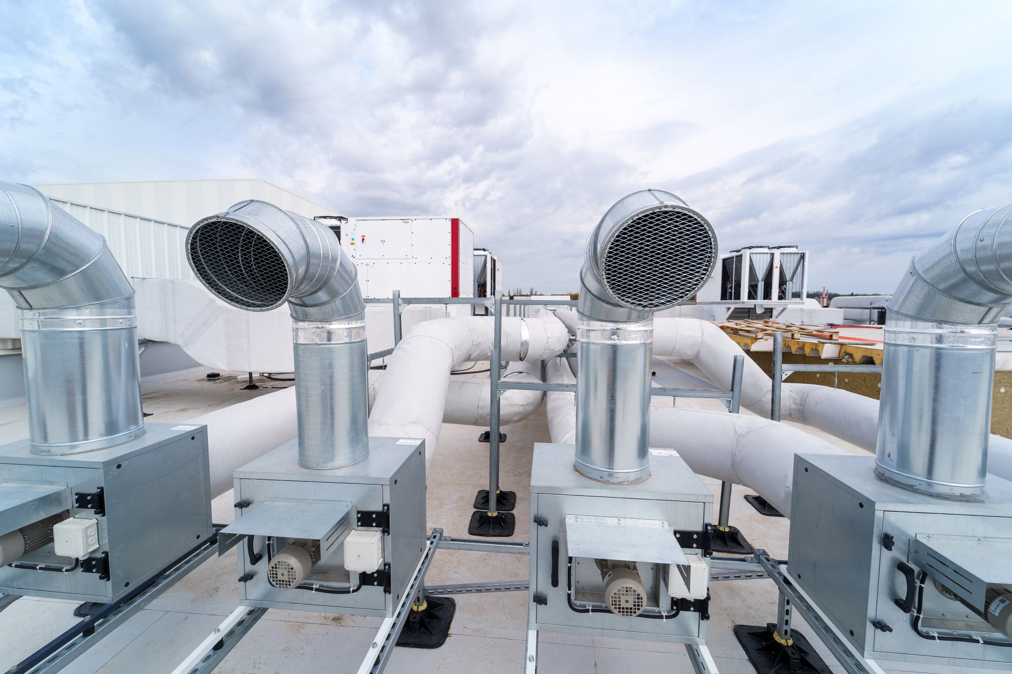 HVAC pipe insulation secured with stainless band